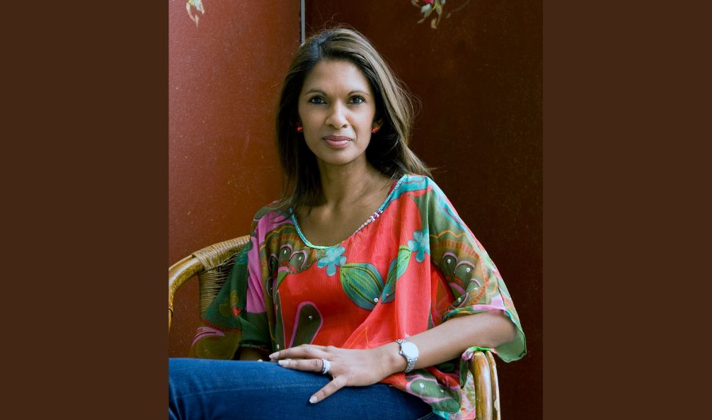 Gina Miller sitting in chair facing camera