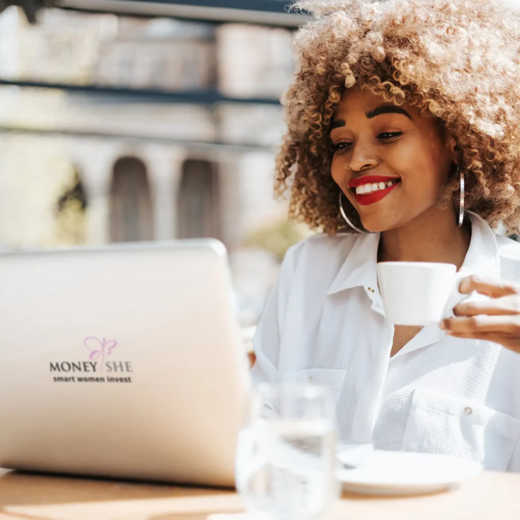 Who-MoneyShe-is-built-for-Woman-on-Laptop1.webp